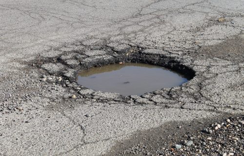 Asphalt-Patching-scaled-two-mens